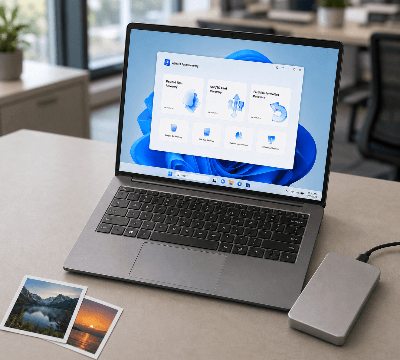AOMEI FastRecovery sur un ordinateur portable à côté d'un disque externe